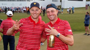 USA Presidents Cup players Jordan Spieth and Justin Thomas celebrate after Team USA won the 2022 Presidents Cup on September 25, 2022 at Quail Hollow Club in Charlotte, North Carolina.