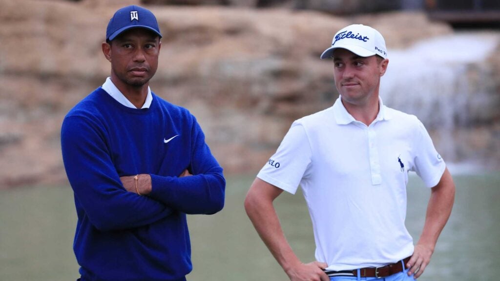 Tiger Woods of the United States and Justin Thomas of the United States celebrate on the 19th green after defeating Rory McIlroy of Northern Ireland and Justin Rose of England in the Payne’s Valley Cup on September 22, 2020 on the Payne’s Valley course at Big Cedar Lodge in Ridgedale, Missouri.