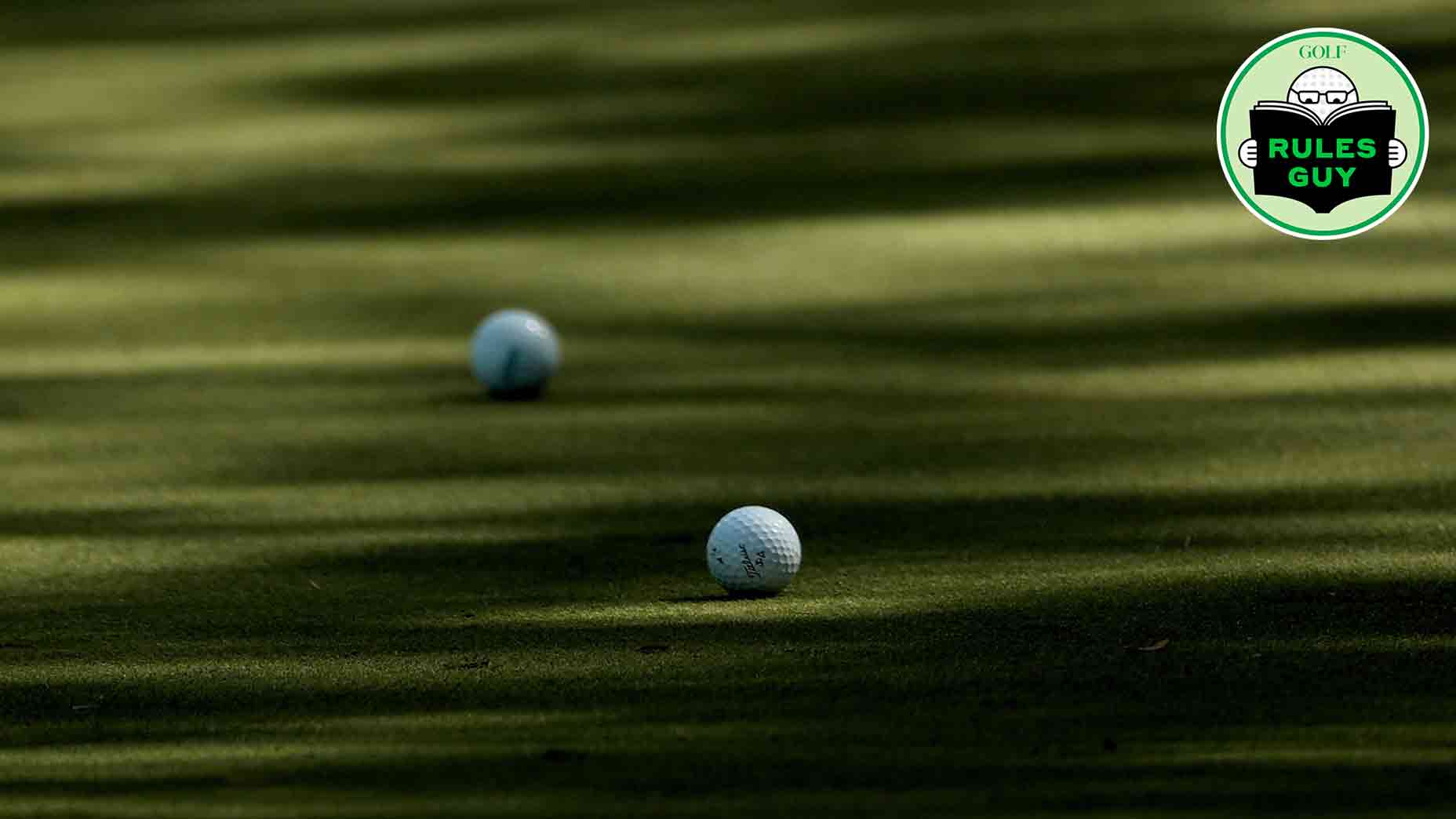 two balls on green
