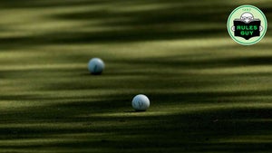 two balls on green