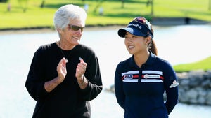 Jenny Shin celebrates with LPGA legend Kathy Whitworth after Shin's two-stroke victory at the Volunteers of America Texas Shootout at Las Colinas Country Club on May 1, 2016 in Irving, Texas