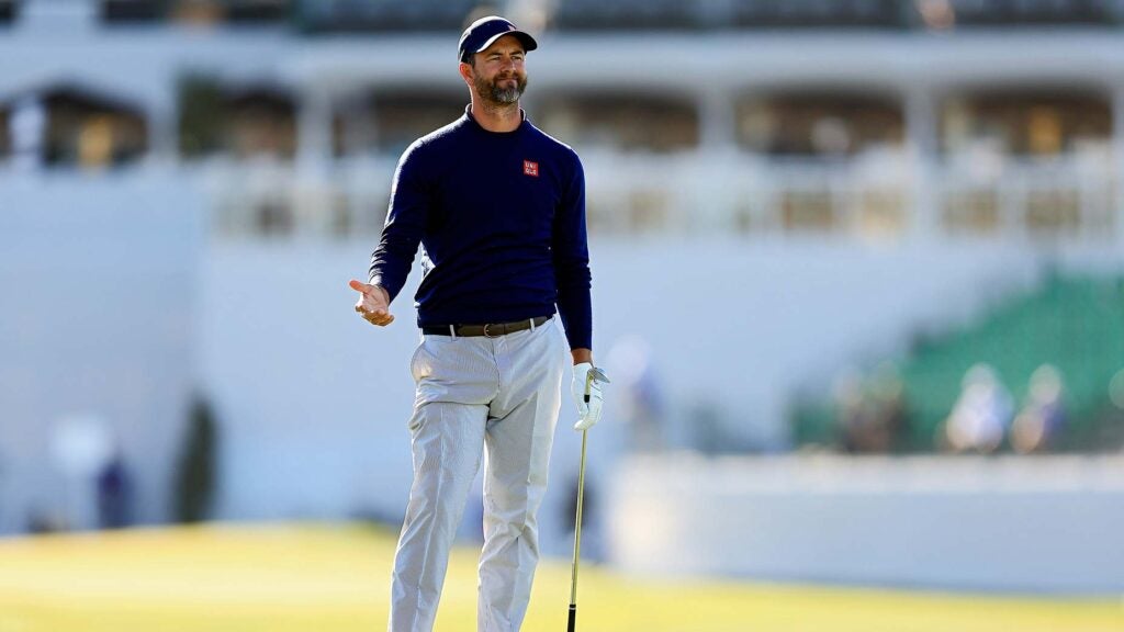 Adam Scott reacts to his approach shot on the 11th hole during the third round of the WM Phoenix Open at TPC Scottsdale on February 12, 2022 in Scottsdale, Arizona.