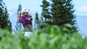 Collin Morikawa of the United States plays his shot from the ninth tee during the third round of the Sentry Tournament of Champions at Plantation Course at Kapalua Golf Club on January 07, 2023 in Lahaina, Hawaii.