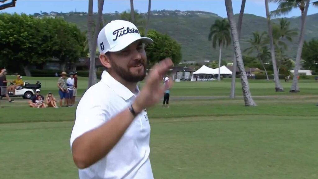 Hayden Buckley celebrates after holing his approach on the 10th hole during the third round of the Sony Open.
