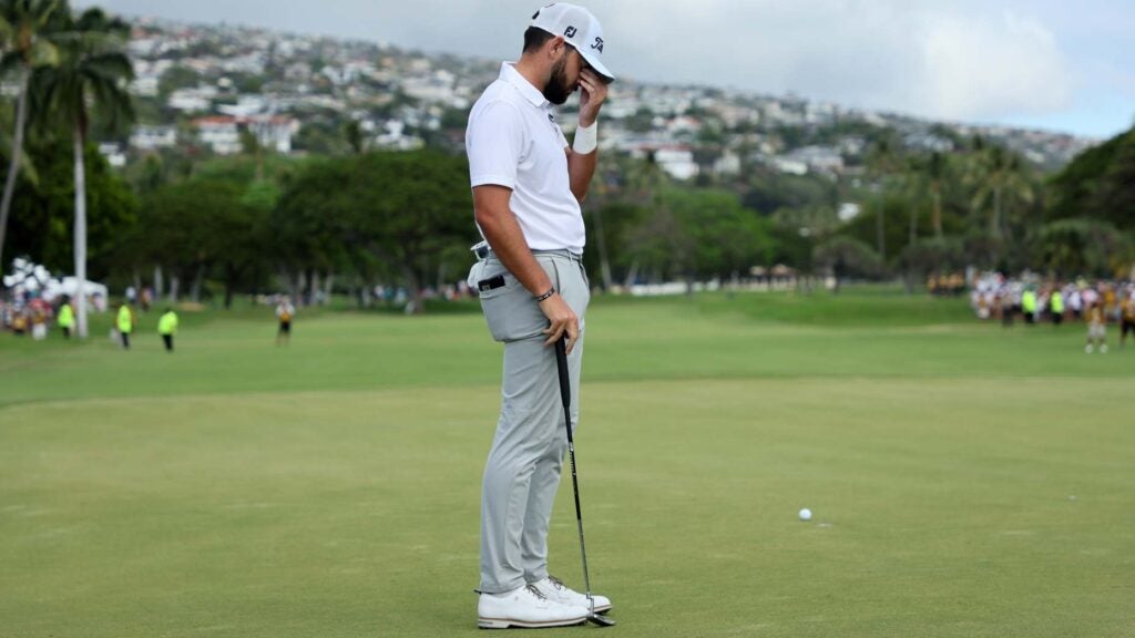 Hayden Buckley of the United States reacts to his missed putt on the 18th green during the final round of the Sony Open in Hawaii at Waialae Country Club on January 15, 2023 in Honolulu, Hawaii.