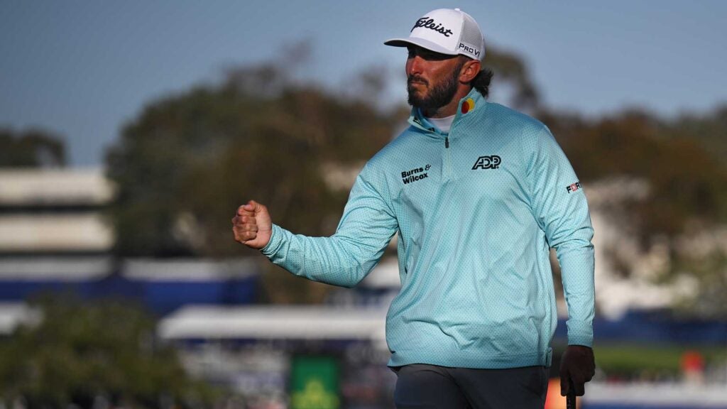 Max Homa of the United States reacts to a putt on the 16th green during the final round of the Farmers Insurance Open on the South Course of Torrey Pines Golf Course on January 28, 2023 in La Jolla, California.