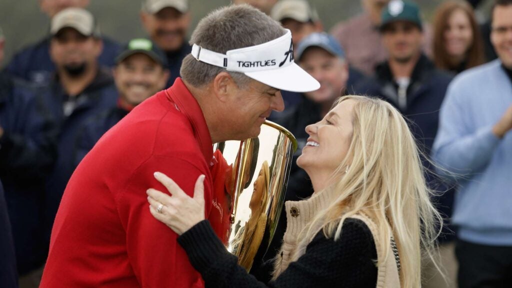 Kenny Perry kisses his wife, Sandy, after he won the overall points title for the Champions Tour following the Final Round of the Charles Schwab Cup Championship at TPC Harding Park on November 3, 2013 in San Francisco, California.