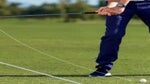 a golfer compresses the golf ball
