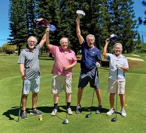 Jones and Co., including actor Pierce Brosnan (second from right), rode out the pandemic on the links of Kauai.