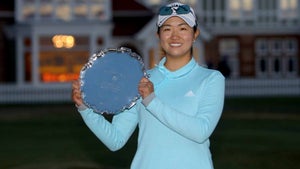 rose zhang holds trophy