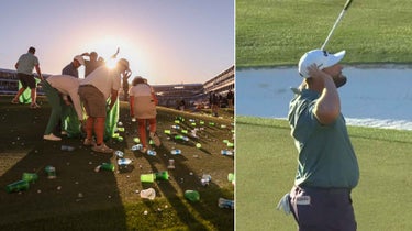 Volunteers clean up trash on the 16th hole during the third round of the WM Phoenix Open at TPC Scottsdale on February 11, 2023 in Scottsdale, Arizona.