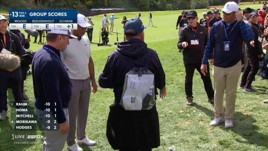 Tiger Woods' tee shot on 13 Sunday ended up in a fan's jacket pocket.