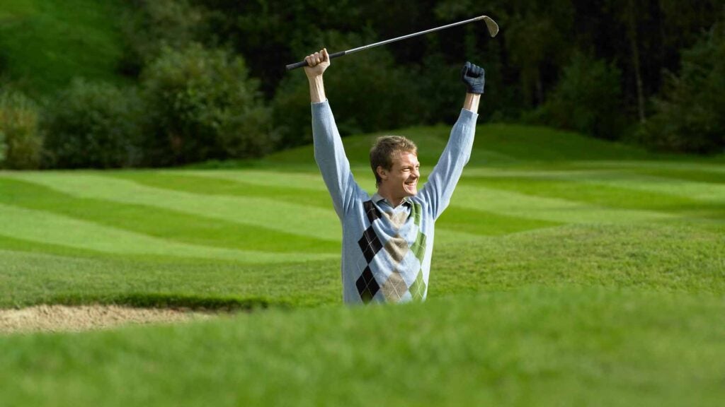 golfer celebrates