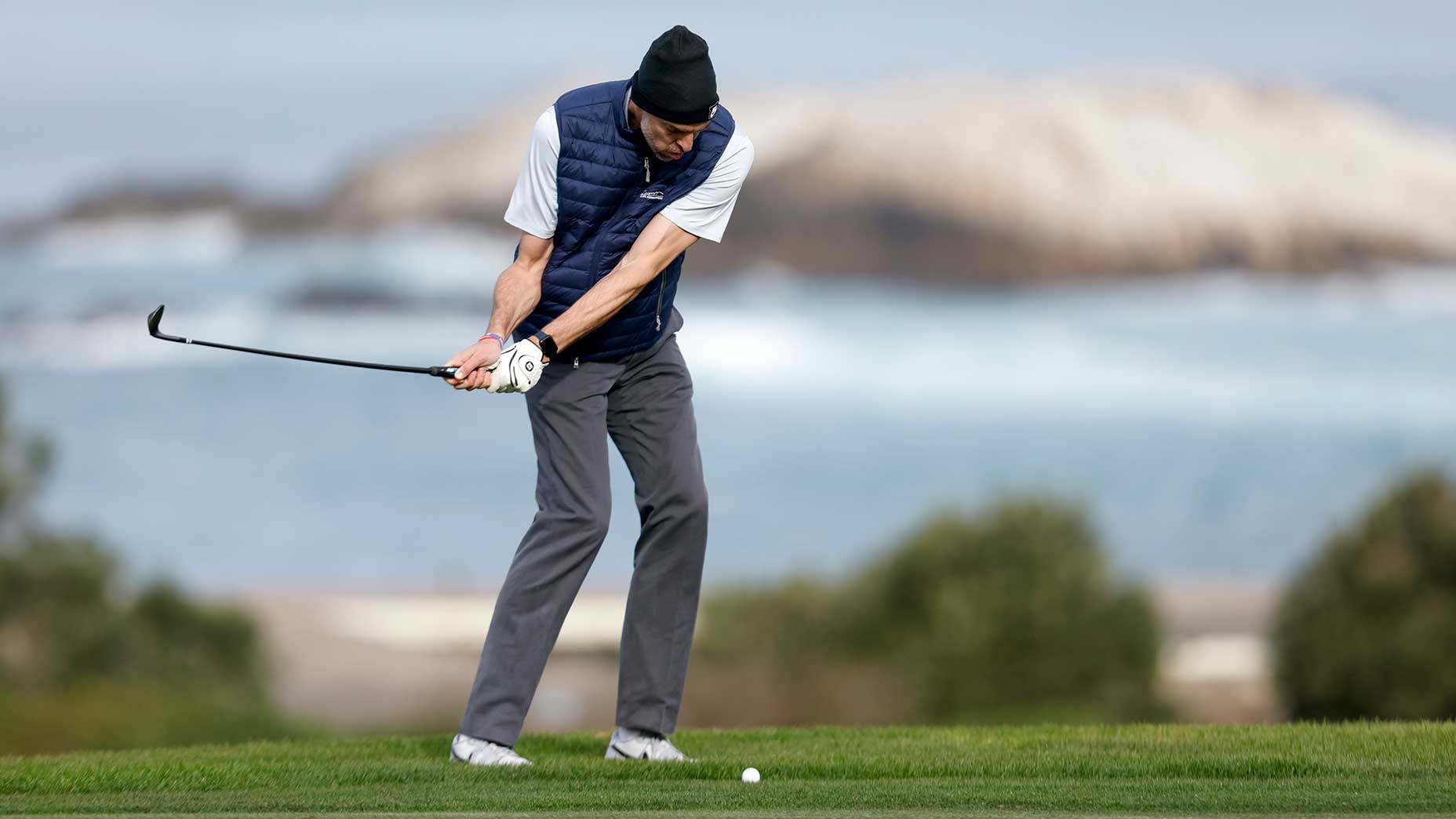 Pau Gasol chips at the AT&T Pebble Beach Pro-Am.