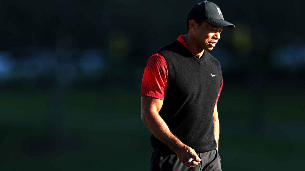 tiger woods stares off distance