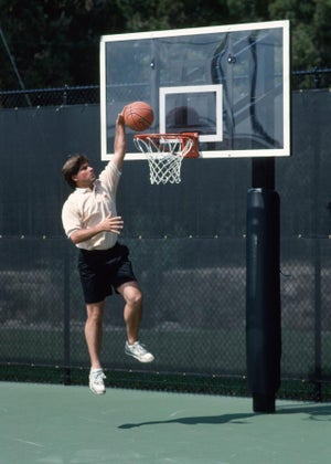 Fred Couples playing basketball in 1990