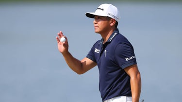 Kurt Kitayama of the United States waves after making birdie on the seventh green during the final round of the Arnold Palmer Invitational presented by Mastercard at Arnold Palmer Bay Hill Golf Course on March 05, 2023 in Orlando, Florida.
