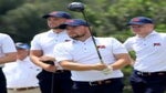Alex Fitzpatrick of the Great Britain and Ireland Walker Cup team plays a shot as Mark Power, Angus Flanagan, and Matty Lamb look on during a practice day prior to The Walker Cup at Seminole Golf Club on May 07, 2021 in Juno Beach, Florida.
