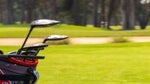 golf clubs on golf cart
