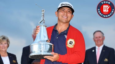 kurt kitayama holds a trophy