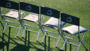 old green chairs at the masters
