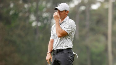 rory mcilroy holds head