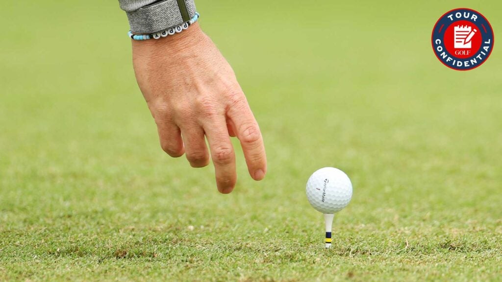rory mcilroy teeing up a ball
