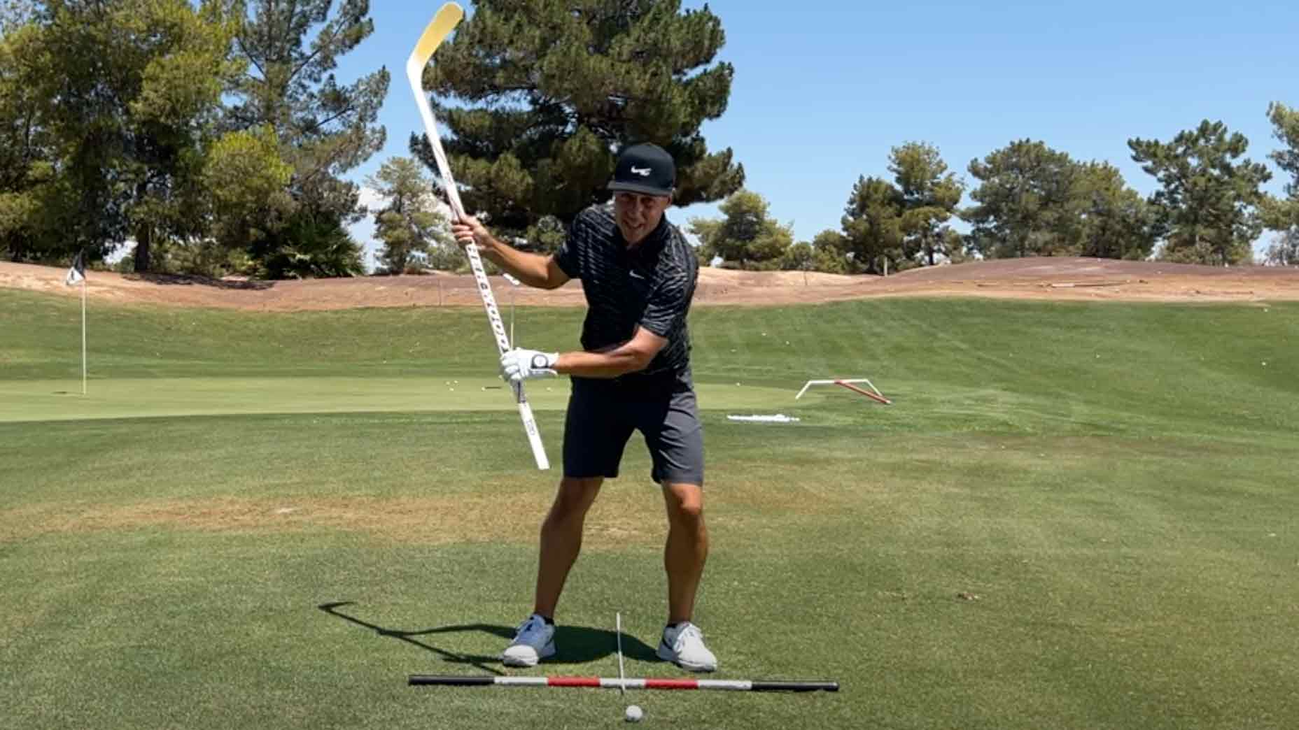 GOLF Top 100 Teacher Martin Chuck shows how to square your golf club face and eliminate slices by using a hockey stick for practice