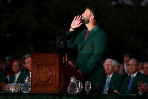 AUGUSTA, GEORGIA - APRIL 09: Jon Rahm of Spain acknowledges the patrons during the Green Jacket Ceremony after winning the 2023 Masters Tournament at Augusta National Golf Club on April 09, 2023 in Augusta, Georgia. (Photo by Patrick Smith/Getty Images)