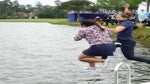 Lilia Vu (L) of the United States jumps in the water after winning in a one-hole playoff against Angel Yin (not pictured) of the United States during the final round of The Chevron Championship at The Club at Carlton Woods on April 23, 2023 in The Woodlands, Texas.