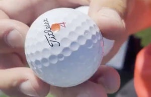 Nick Hardy's tournament round golf ball markings.
