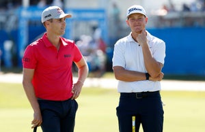 Matthias Schwab of Austria and Vincent Norrman of Sweden on the 18th green during the third round of the Zurich Classic of New Orleans at TPC Louisiana on April 22, 2023 in Avondale, Louisiana.