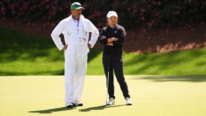 jenny bae stands with her caddie