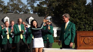 rose zhang holds trophy
