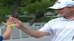Emiliano Grillo invited two fans to hit balls with him as he waited for the playoff to begin at the Charles Schwab Challenge.