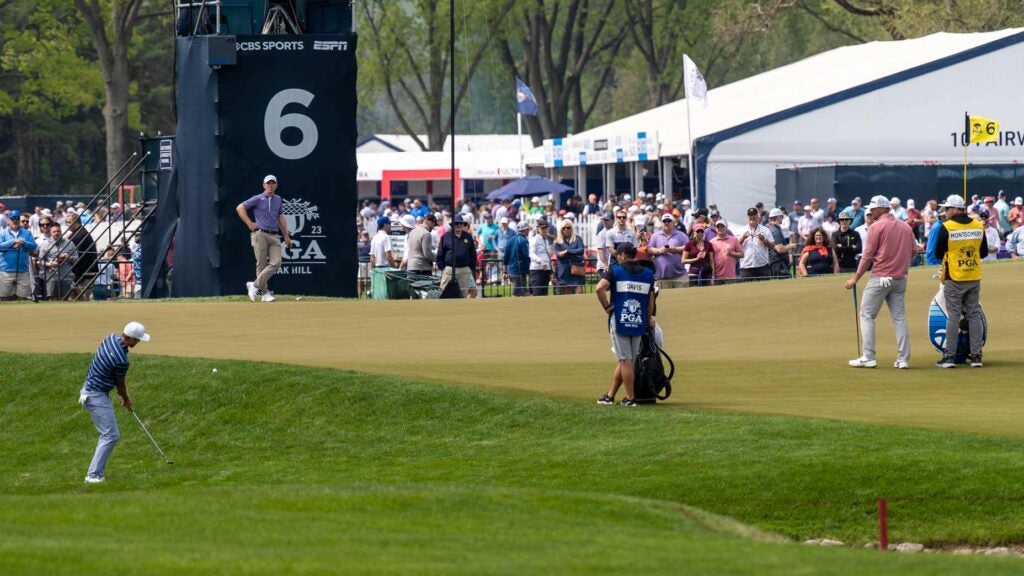 Cam Davis hits a chip shot to the sixth green at Oak Hill during the second round of the PGA Championship.