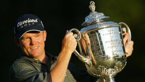 Shaun Micheel of the USA holds the trophy after winning the 85th PGA Championship at Oak Hill Country Club on August 17, 2003 in Rochester, New York.