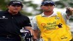 bones mackay stands with phil mickelson