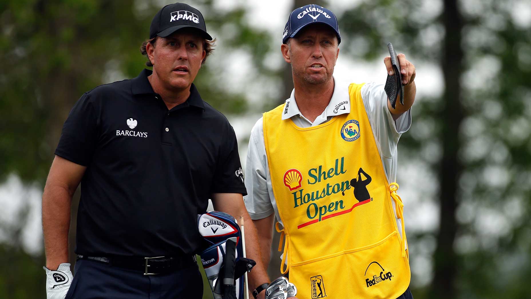 bones mackay stands with phil mickelson