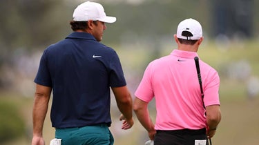 Brooks Koepka and Rory McIlroy at the U.S. Open on Friday.