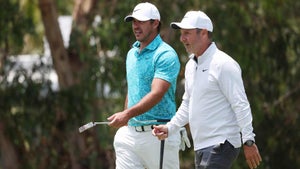 Brooks Koepka of the United States and caddie Ricky Elliott walk on the 14th green during a practice round prior to the 123rd U.S. Open Championship at The Los Angeles Country Club on June 13, 2023 in Los Angeles, California.