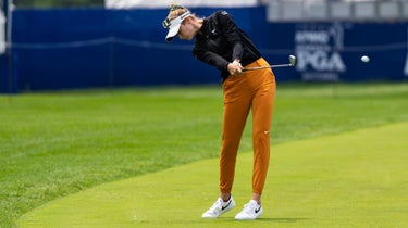 Nelly Korda hits an approach shot to the 18th green at Baltusrol Golf Club's Lower Course during a practice round for the KPMG Women's PGA on Tuesday, June 20.