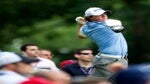 Rory McIlroy of Northern Ireland hits his tee shot on the 4th hole in the third round of the U.S. Open on Saturday, June 18, 2011, at Congressional Country Club in Bethesda, Maryland.