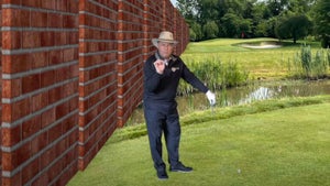 GOLF Top 100 Teacher Lou Guzzi says that envisioning a brick wall to your back can help improve your club path for straighter, longer shots