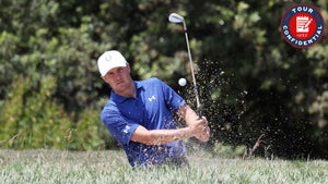 jordan spieth hits out of a bunker