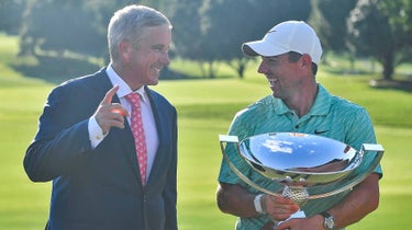 PGA Tour commissioner Jay Monahan shares a laugh with Rory McIlroy after McIlroy won the Tour Championship in August 2022.