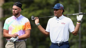 NFL athletes Travis Kelce and Patrick Mahomes on golf course