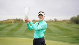 Gabi Ruffels holds the trophy after winning the 2023 Carlisle Arizona Women's Golf Classic.