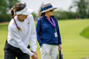 AnnaMaria Ruffels watches her daughter Gabi putt during a practice round for the 2023 KPMG Women's PGA Championship.