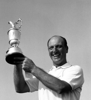 An elated Roberto de Vicenzo, 44, holds the trophy aloft after winning the British Open Golf Championship and 2,100pounds at the Royal Liverpool course at Hoylake, Cheshire. Mr de Vicenzo is the first Argentinian to win the title, with a winning four-round aggregate of 278, two strokes ahead of the defending champion Jack Nicklaus of the USA. * In 9 previous attempts, had at least 5 times been within sight of victory always to fail at the end.